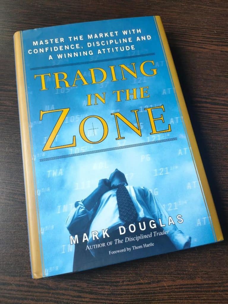 Trading in the Zone by Mark Douglas, a landmark book on trader psychology